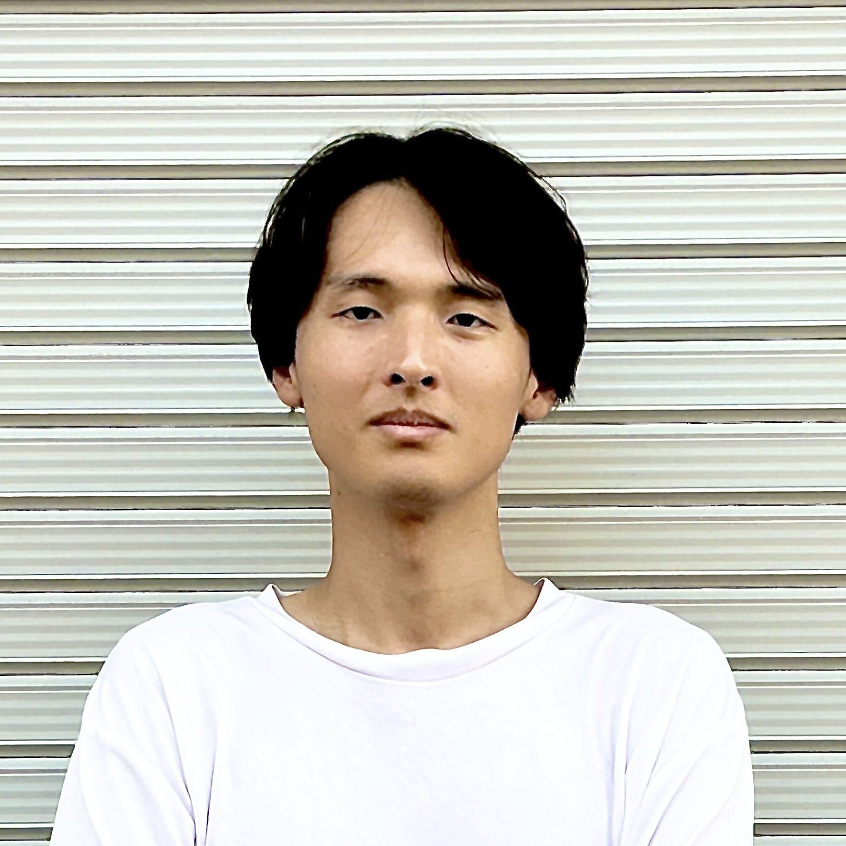 編集長 前村
